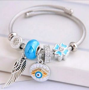 Turquoise Angel feather  & Eye charm bracelet